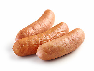 Image showing smoked sausages on white background