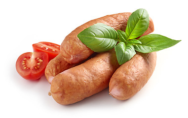 Image showing smoked sausages on white background