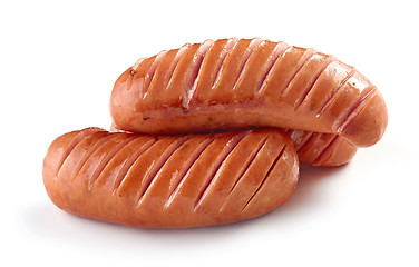 Image showing grilled sausages on white background