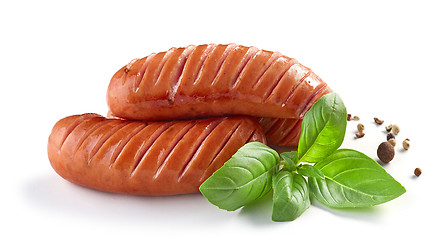 Image showing grilled sausages on white background