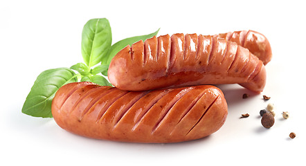 Image showing grilled sausages on white background