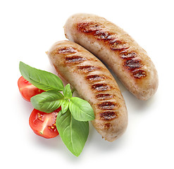 Image showing grilled sausages on white background