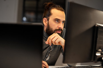 Image showing close up of creative man working at night office