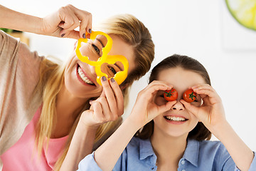 Image showing happy family cooking and having fun at kitchen