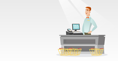 Image showing Cashier standing at the checkout in a supermarket.