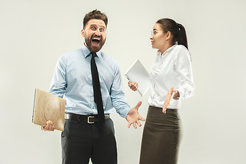 Image showing Winning success woman and man happy ecstatic celebrating being a winner.