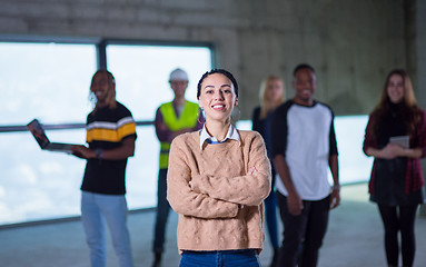 Image showing young businesswoman on construction site