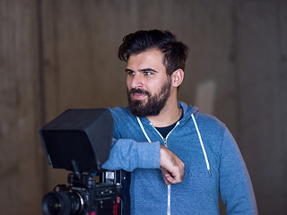 Image showing portrait of videographer at work