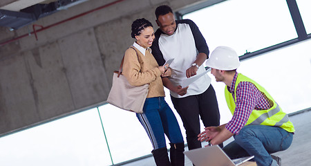 Image showing multiethnic business people in group, architect and engineer on 