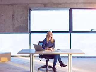 Image showing young female architect on construction site