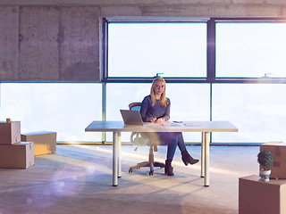 Image showing young female architect on construction site