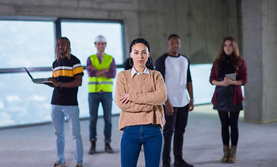 Image showing young businesswoman on construction site