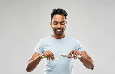 Image showing indian man with toothbrush and toothpaste