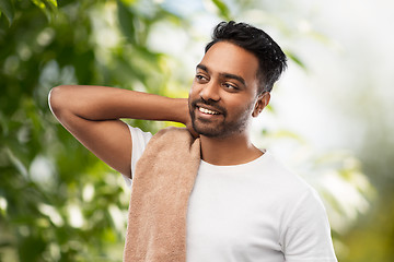 Image showing indian man with towel over natural background