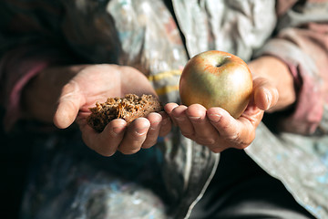 Image showing Male beggar hands seeking food or money at public path way