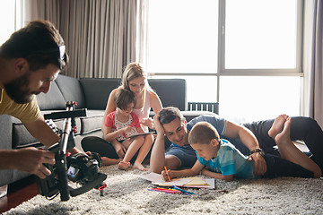 Image showing young couple spending time with kids