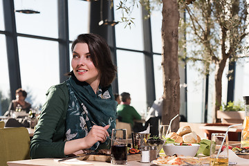 Image showing young woman at a restaurant