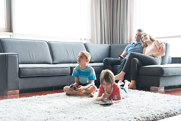 Image showing couple spending time with kids