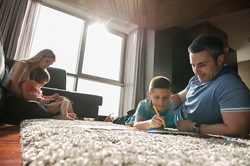 Image showing young couple spending time with kids