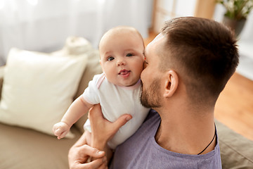 Image showing close up of father with little baby girl at home