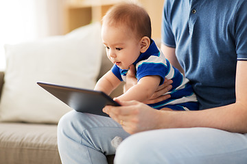 Image showing baby and father with tablet pc at home