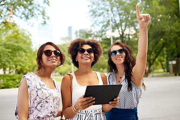 Image showing women with tablet pc on street in summer