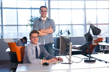 Image showing Two Business People Working With computer in office