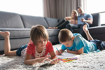 Image showing young couple spending time with kids