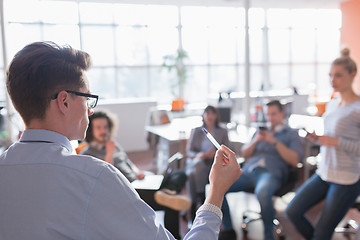 Image showing Young Business Team At A Meeting at modern office building