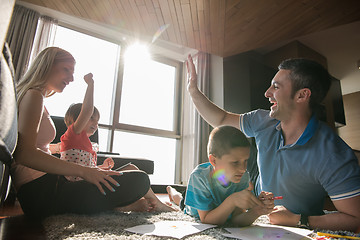 Image showing young couple spending time with kids