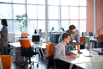 Image showing Two Business People Working With computer in office