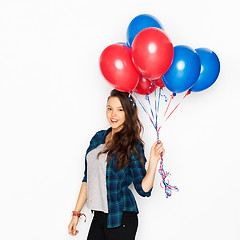 Image showing happy teenage girl with helium balloons