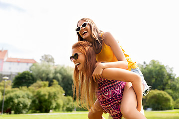 Image showing happy teenage girls having fun at summer park