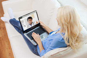 Image showing patient having video call with doctor on laptop