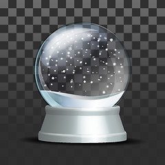 Image showing Snow globe with falling snowflakes.