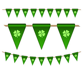 Image showing Green festive flags with clovers