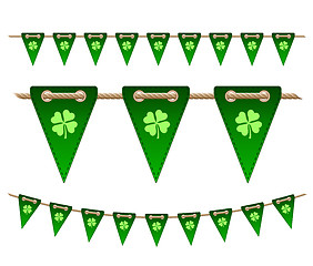 Image showing Green festive flags with clovers