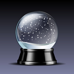 Image showing Snow globe with falling snowflakes.