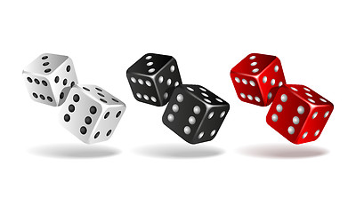 Image showing Set of falling dice isolated on white.