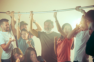 Image showing Sweaty armpits. Sweaty man. Bus. Public transport. The unhappy people near man