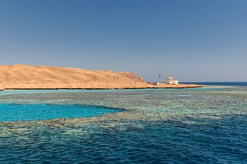 Image showing Small island with coral reef