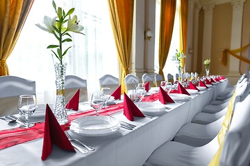 Image showing Large dining hall with tables set up