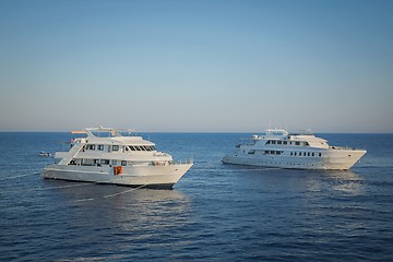 Image showing Luxury yacht docking near coral reef