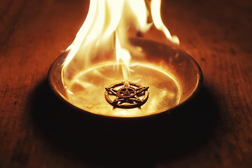 Image showing Old pentagram burning in flames