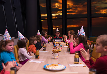 Image showing young boy having birthday party