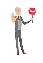 Image showing Caucasian businessman holding stop road sign.