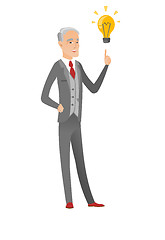 Image showing Caucasian businessman pointing at idea lightbulb.