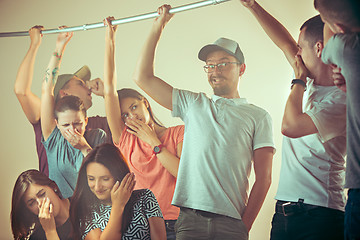 Image showing Sweaty armpits. Sweaty man. Bus. Public transport. The unhappy people near man