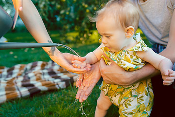 Image showing The watering can for the garden and baby