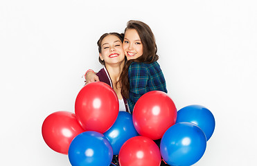 Image showing happy teenage girls with helium balloons